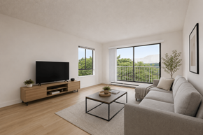 Surrey apartment for rent - A living room with a grey couch, a wooden cabinet, a flat screen TV and a glass coffee table.