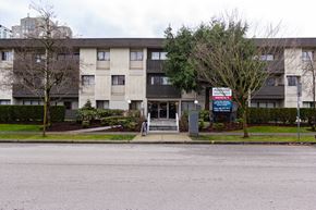 Surrey apartment for rent - A large apartment complex with a sign that says "PANORAMA".