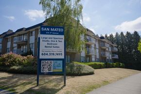 New Westminster apartment for rent - A sign for San Mateo apartment complex with a QR code on it.