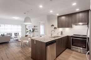 Port Coquitlam apartment for rent - a kitchen and dining room in a house