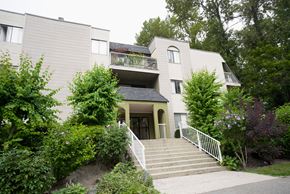 Burnaby apartment for rent - A house with a staircase leading to the front door.