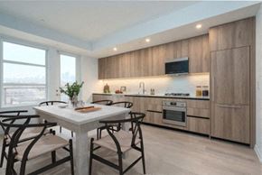 Los Angeles apartment for rent - A modern kitchen with a dining table and chairs. at SMB Hollywood Apartments, Apartments, Los Angeles, CA