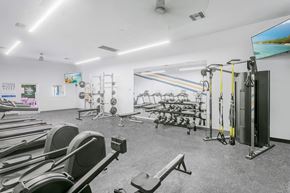Phoenix apartment for rent - A gym with treadmills, weights, and exercise equipment.