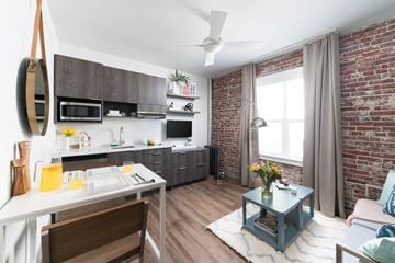 Los Angeles apartment for rent - A kitchen with a dining table and chairs.