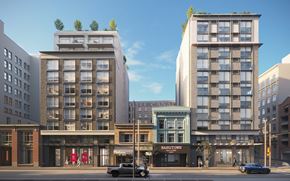 Vancouver apartment for rent - A street view of a city with buildings, cars, and a pedestrian.