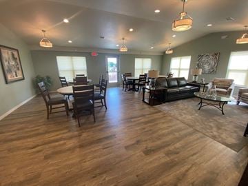 North Branch townhouse for rent - a large living room with a dining room table and chairs