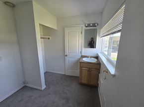 Poulsbo apartment for rent - A bathroom with a sink and a window.