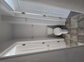 Poulsbo apartment for rent - A bathroom with a toilet and a shower.