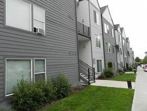 Port Orchard apartment for rent - Row of grey townhouses at The Charleston Port Orchard, Port Orchard, Washington