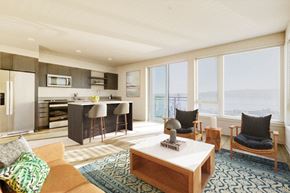Bremerton apartment for rent - a living room filled with furniture and a large window at Marina Square, Bremerton, WA, 98337