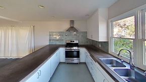 Monterey apartment for rent - a kitchen with a stove and a sink
