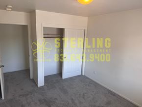 Monterey apartment for rent - A room with Sterling Management logo and number on the wall.
