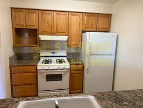 Monterey apartment for rent - A kitchen with a stove, oven, and refrigerator.