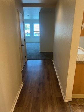 Monterey apartment for rent - an empty house with a hallway with a wood floor