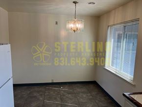 Salinas apartment for rent - A Sterling Property Management office with a phone number on the wall.