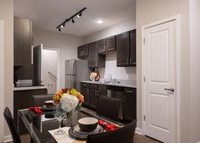 Olathe apartment for rent - A fully-equipped kitchen at Aspen Ridge 55+ Apartment Community in Olathe, KS.