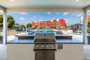 Des Moines apartment for rent - the preserve at ballantyne commons clubhouse with a gas grill and pool