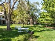 Overland Park townhouse for rent - A park with benches and trees.