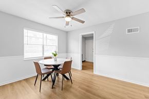 Kansas City apartment for rent - A dining room with a table and chairs.