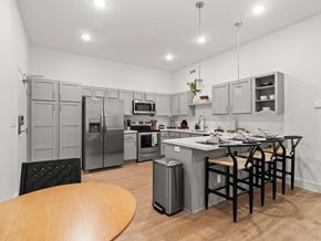 Bentonville apartment for rent - A Kitchen With Fridge at G at Market Apartments, Bentonville, Arkansas