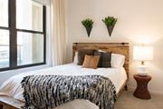 Overland Park apartment for rent - Bedroom with cozy bed at The Residences at Galleria, Overland Park, Kansas