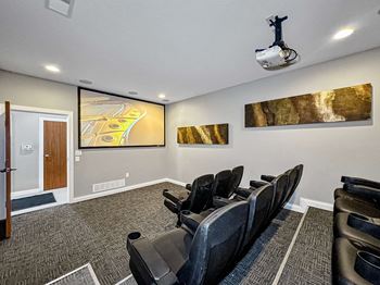 A clubhouse with movie theatre 