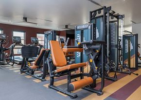 Castle Rock apartment for rent - A gym with a row of exercise machines.