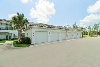 A house with a palm tree in front of it
