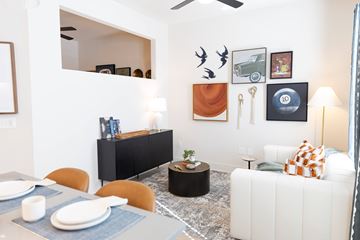 Canton apartment for rent - Table, painting on wall and couch at District on the Etowah Apartments, Canton, 30114