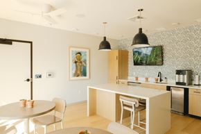 Madison apartment for rent - a kitchen and dining area with a table and chairs