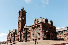 Duluth apartment for rent - a large brick building with a clock tower
