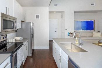 Stainless steel sink with faucet in kitchen