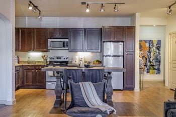 Chef-inspired kitchens with rich walnut cabinets