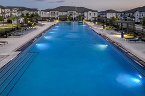 Rowlett apartment for rent - resort-inspired swimming pool at Reveal on the Lake apartments