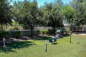 Phoenix apartment for rent - A playground with a slide and a green slide.
