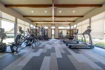 Two 24-hr fitness centers with high-impact cardio equipment