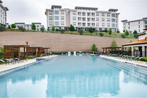 San Antonio apartment for rent - A large indoor swimming pool with a long rectangular shape.