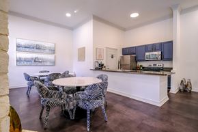 Austin apartment for rent - resident social area with a kitchen and dining area at San Marin apartments