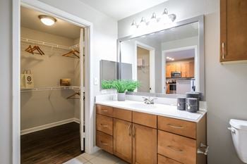 Spacious bathrooms with custom cabinetry