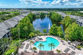 Kissimmee apartment for rent - An ariel view of the pool and pond at Verano apartments