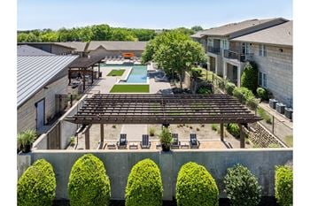 Outdoor pergola lounging area