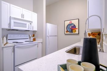 Well appointed kitchen with custom cabinetry