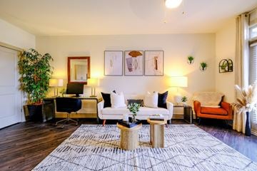 Lawrenceville apartment for rent - a living room with a couch and a table