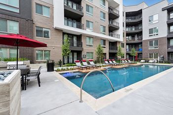 Sparkling swimming pool and lounge are