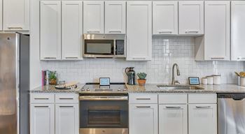 Custom cabinetry in two color schemes to choose from; sleek espresso or opulent white