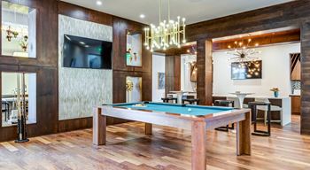 Social and entertainment lounge with billiards and plenty of mingle areas with comfortable seating