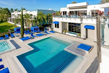 Infinity edge pool with cabanas
