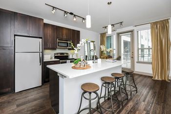 Kitchens with quartz countertops and islands