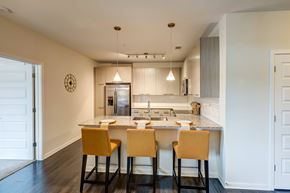 Chapel Hill apartment for rent - A kitchen with a table and chairs in front of it.