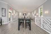 Gahanna apartment for rent - A dining room with a wooden table and chairs.